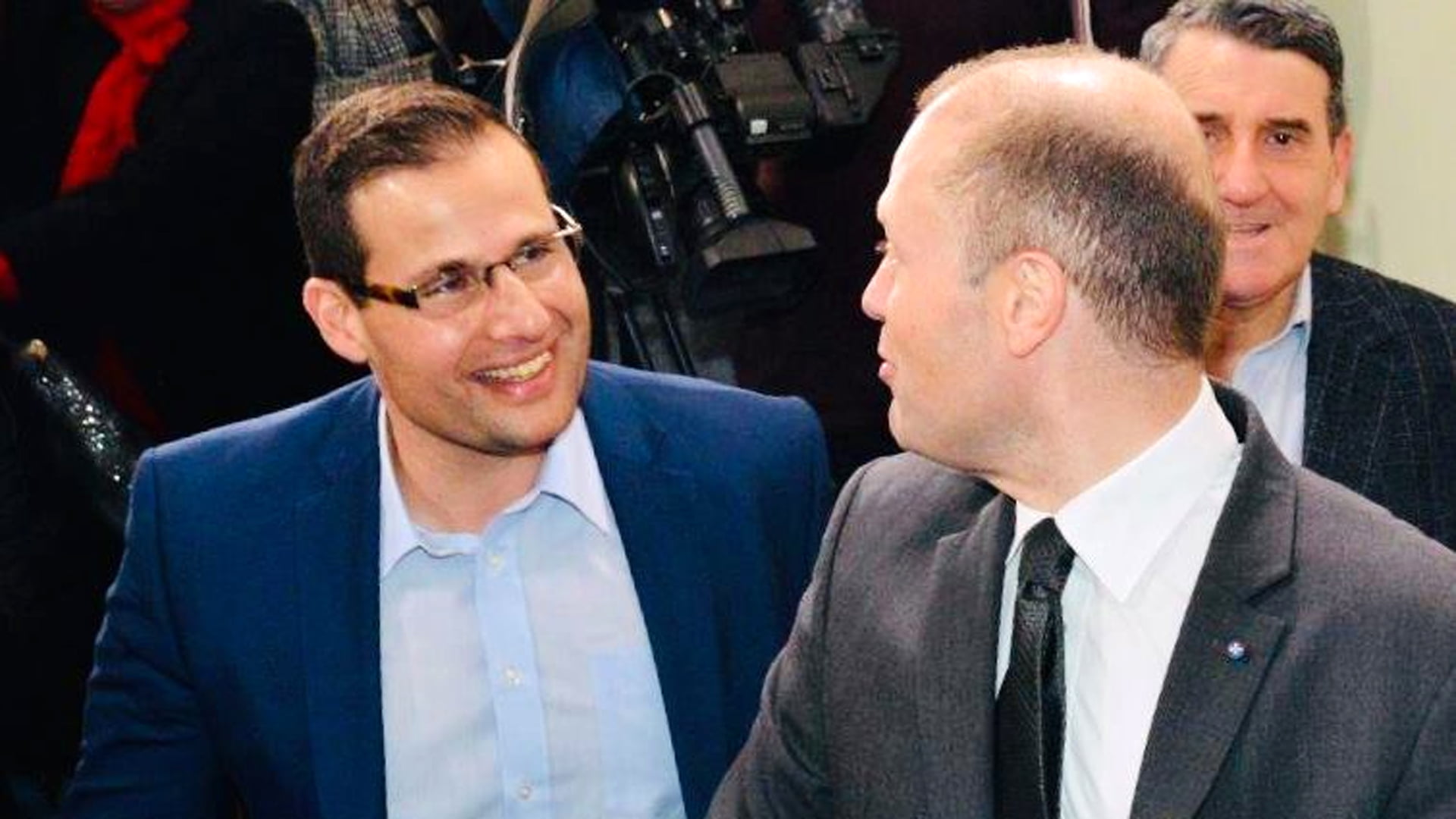 Robert Abela with Joseph Muscat.
